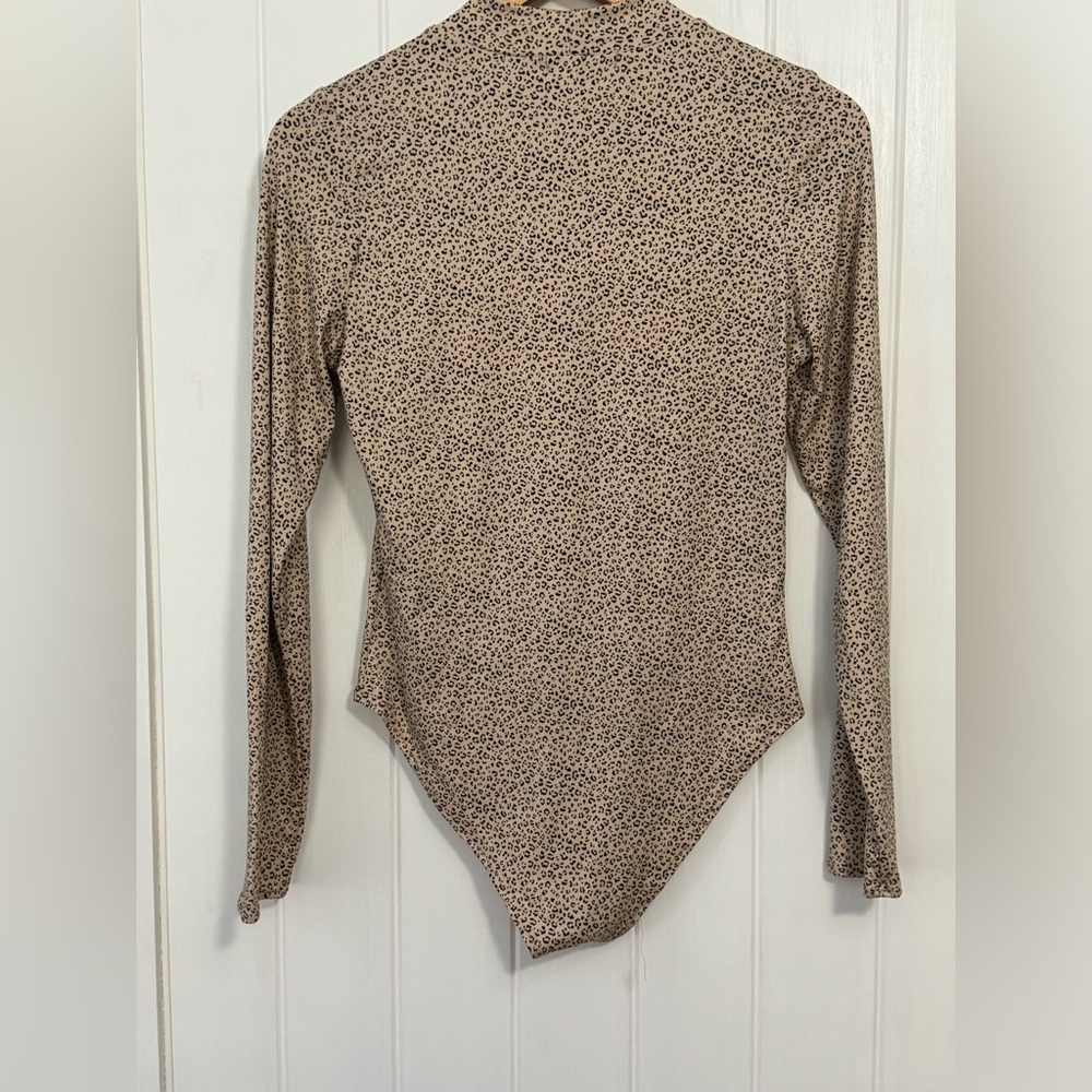 Women’s animal print body suit